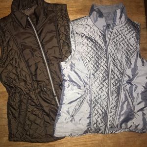 Two large Hannah brand zip up vests
